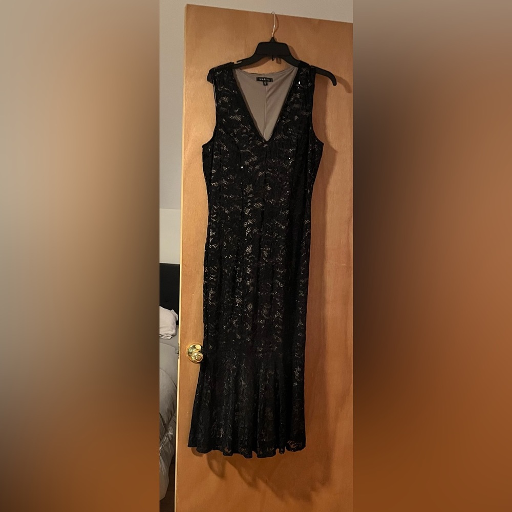 Long black lace Marina dress. Great for wedding guest or holiday parties.